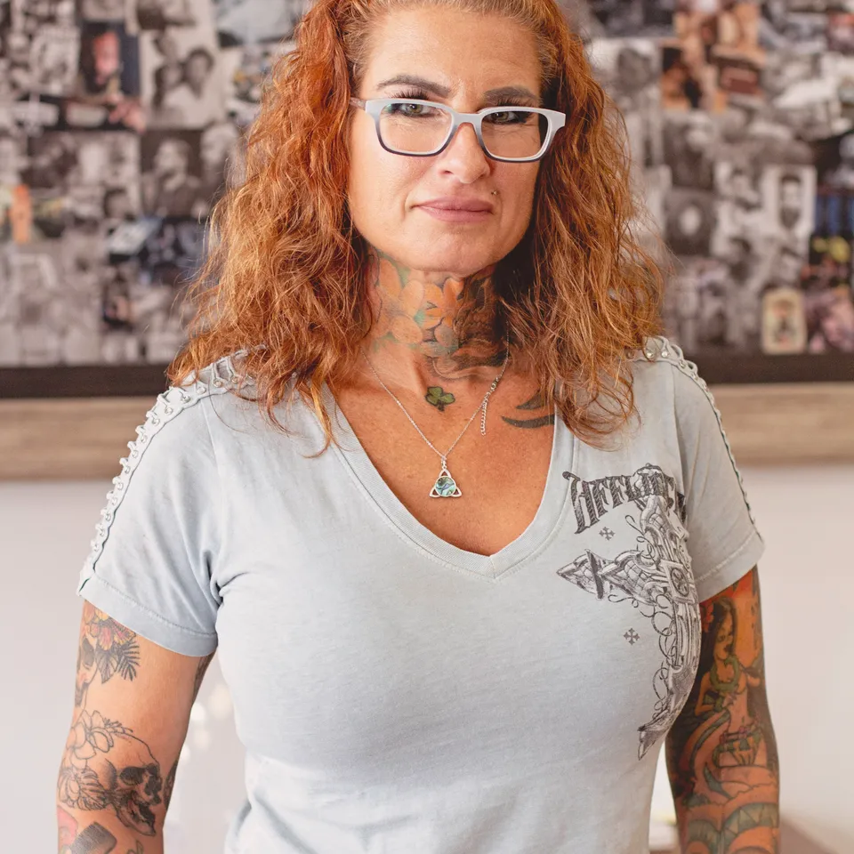 April, owner and licensed barber at Vintage Barbershop and Salon